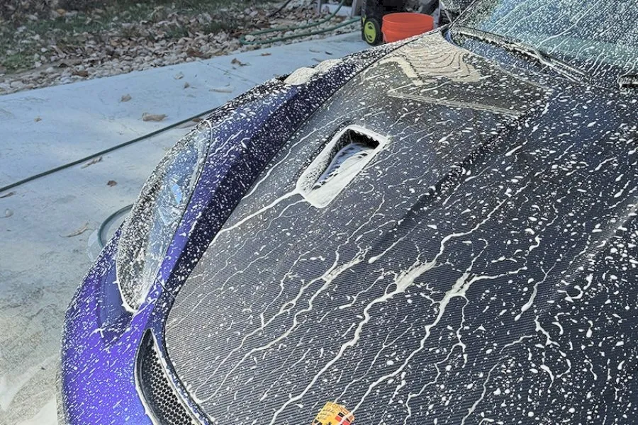 Water beading tightly on a freshly ceramic-coated hood