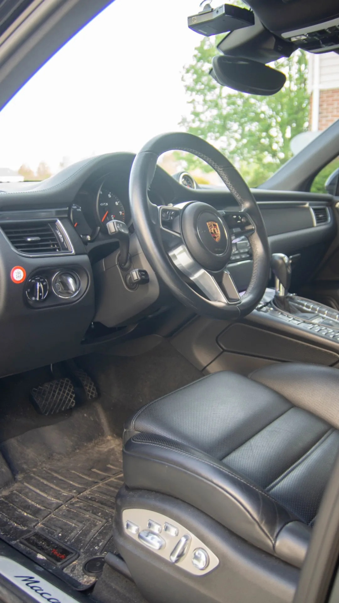 Macan GTS driver's side interior before detailing