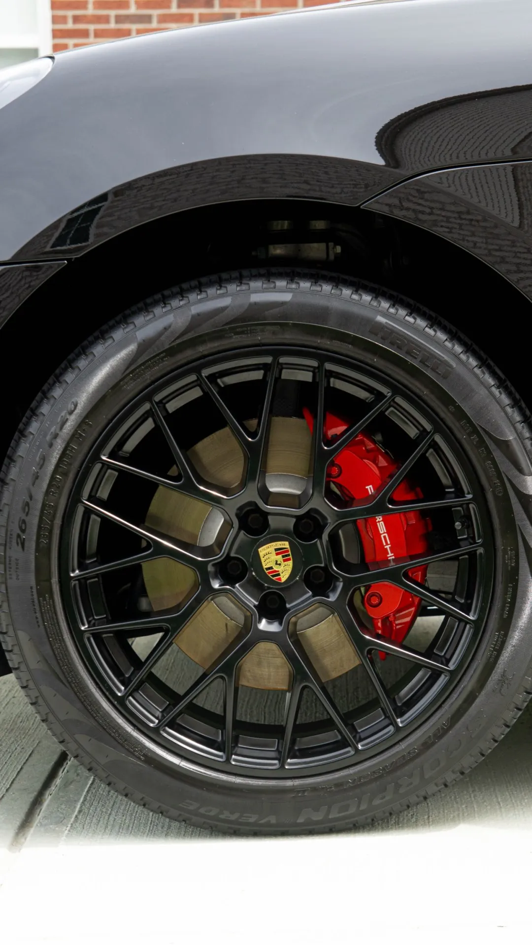 Porsche wheel and caliper after detailing